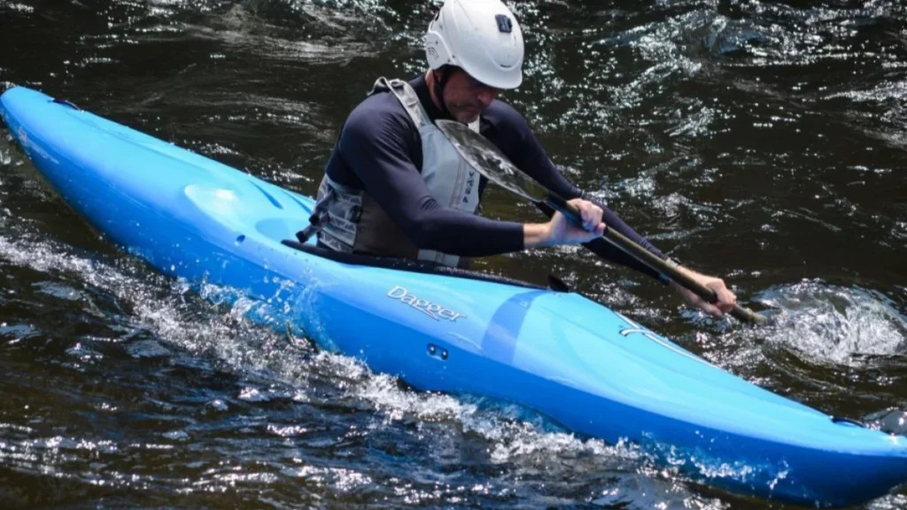 Kayakers paddling a river in the Atlas Mountains